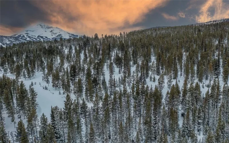Aerial view of lot showing gentle slope and proximity to Big Sky Resort.